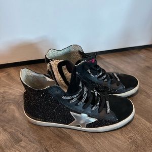 Worn a couple of times. Like new.